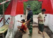 Kodim 0108/Agara dan Warga Laksanakan Pengecatan Jembatan Gantung di Desa Buntul Kendawi, Aceh Tenggara 