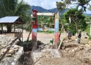 Kodim 0108/Agara Cat Pondasi Jembatan Gantung di Ds. Kuning Abadi, Aceh Tenggara