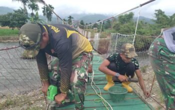 Kodim 0108/Agara dan Masyarakat Percepat Finishing Jembatan Gantung di Ds. Kuta Ujung, Aceh Tenggara